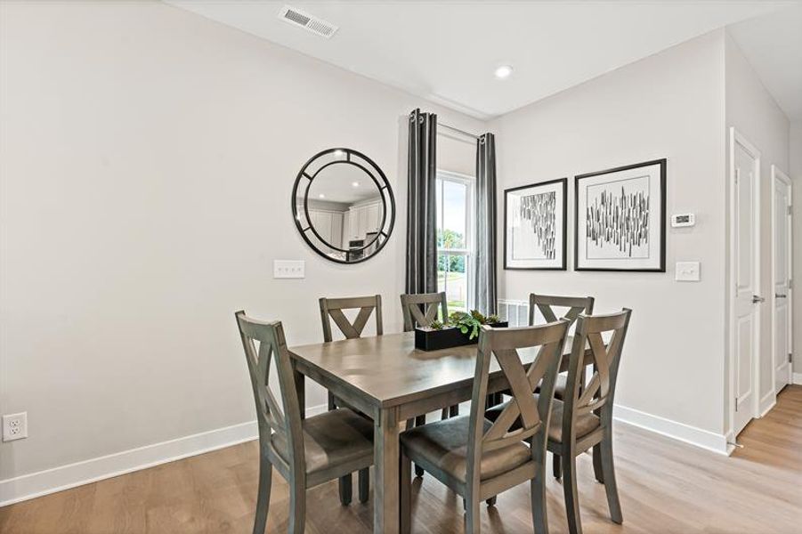 Representative furnished interior of a home built from the Roxbury Grande by Ryan Homes in Griffin Farm Townes, Pittsboro (Image 10).