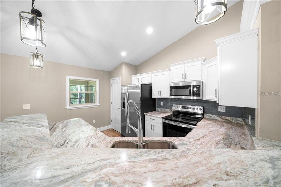 Furnished interior view inside a new home in , Dunnellon (Image 4).