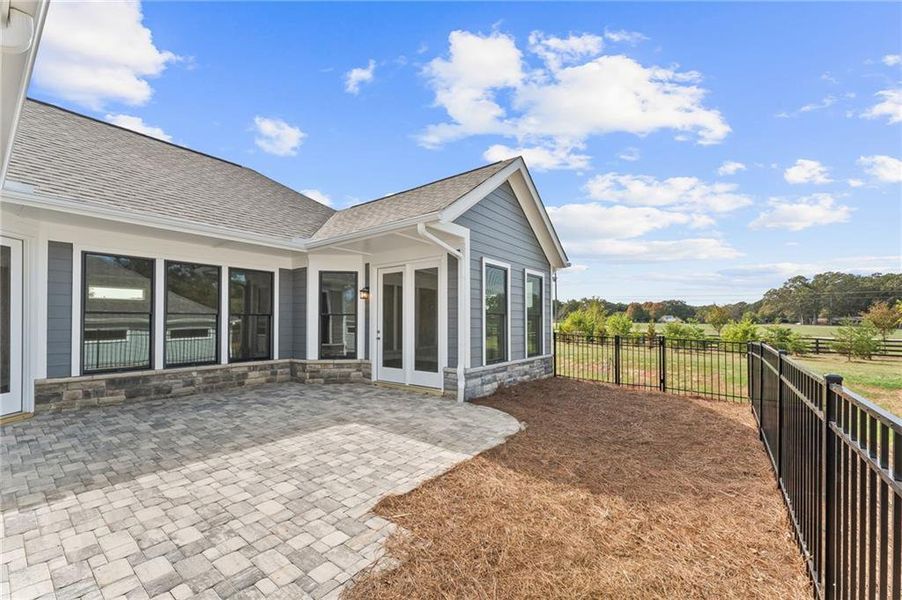 Exterior details and patio area of a home in The Courtyards at Post Road, Cumming (Image 2).