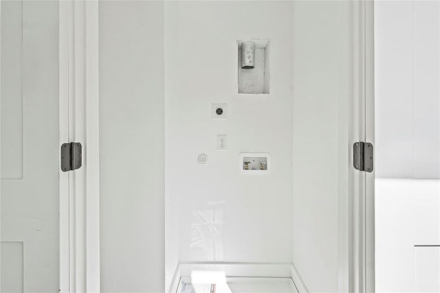 Laundry room featuring hookup for a washing machine and electric dryer hookup