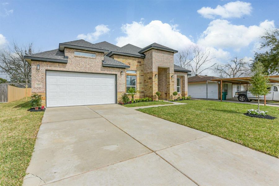 Front exterior of a new home in , Pasadena, TX, highlighting curb appeal (Image 1). Front exterior of a new home in , Pasadena, TX, highlighting curb appeal (Image 1).