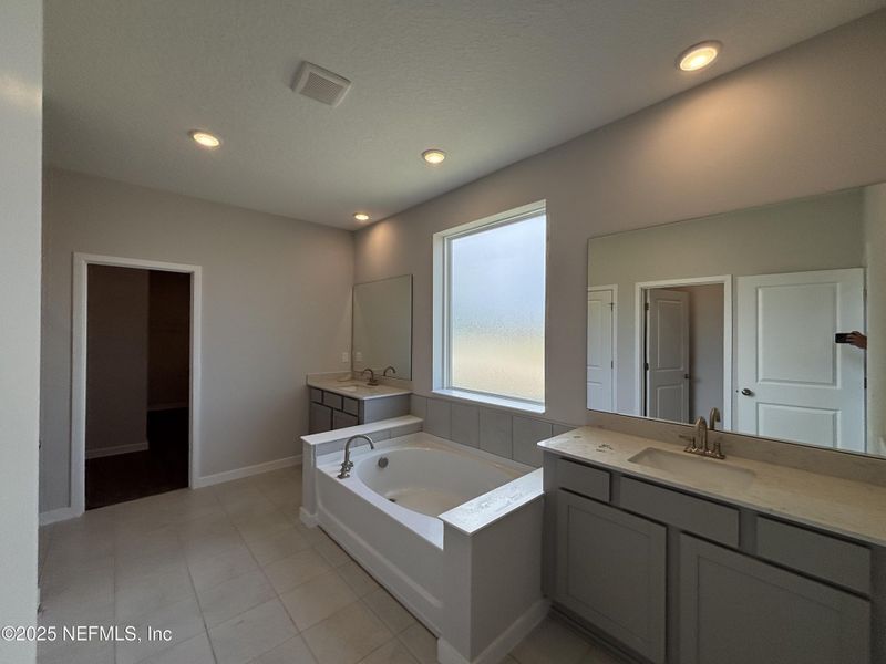 Furnished interior view inside a new home in The Cypress Series at Reserve East, Flagler Beach (Image 9).