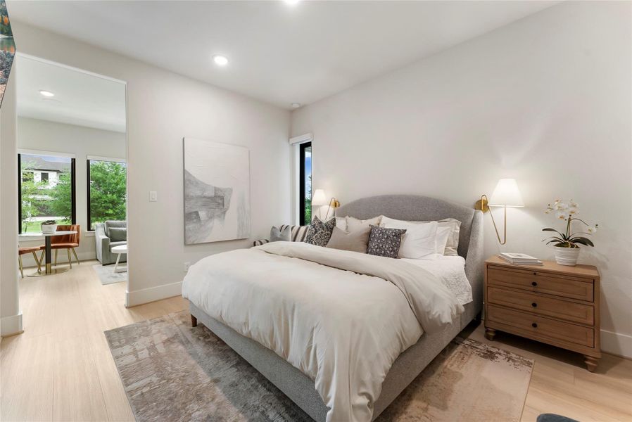 The private guest quarters offers approximately 420 SF with a comfortable bedroom space with direct access to its own living area and kitchenette. This layout is ideal for extended guests, multigenerational living, or long term household flexibility.