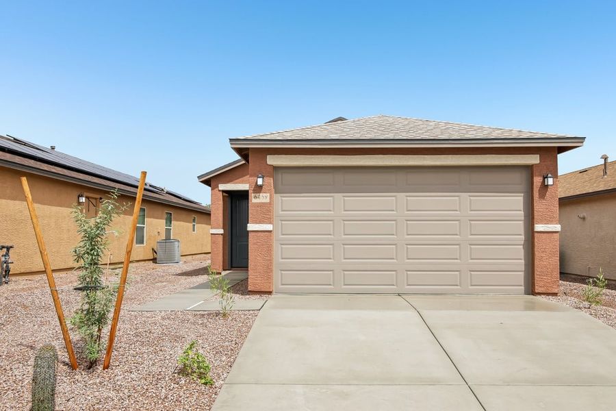 Front exterior of a new home in Saguaro Haven, Tucson, AZ, highlighting curb appeal (Image 2). Front exterior of a new home in Saguaro Haven, Tucson, AZ, highlighting curb appeal (Image 2).