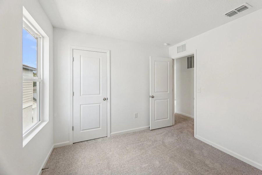 Representative unfurnished interior of a home built from the Lyon by Starlight Homes in Hawks Run, Kissimmee (Image 29). Representative unfurnished interior of a home built from the Lyon by Starlight Homes in Hawks Run, Kissimmee (Image 29).