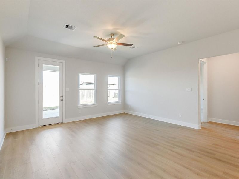 Spacious, unfurnished interior of a new home in Sunterra, Katy (Image 22).