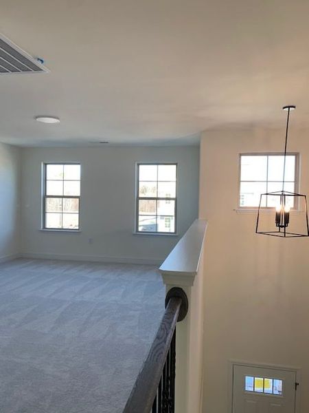 Spacious, unfurnished interior of a new home in Royal Pines, Trinity (Image 28).