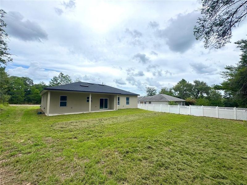 Exterior details and patio area of a home in , Citrus Springs (Image 21).