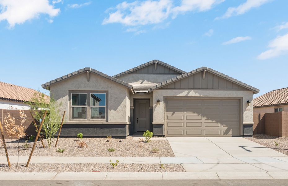 Front exterior of a new home in Artisan at Asante, Surprise, AZ, highlighting curb appeal (Image 2). Front exterior of a new home in Artisan at Asante, Surprise, AZ, highlighting curb appeal (Image 2).