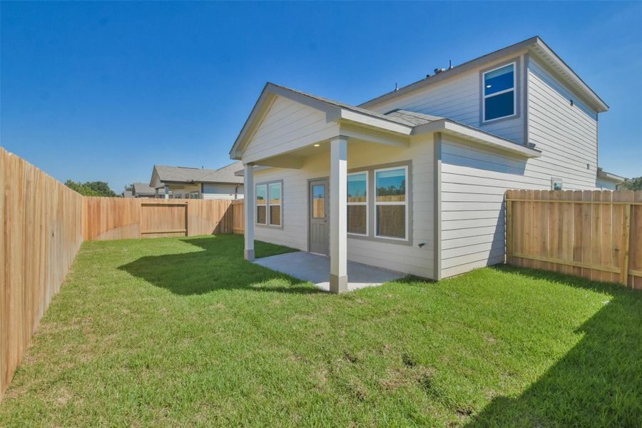 Front exterior of a new home in The Villages at WestPointe, Dayton, TX, highlighting curb appeal (Image 84).