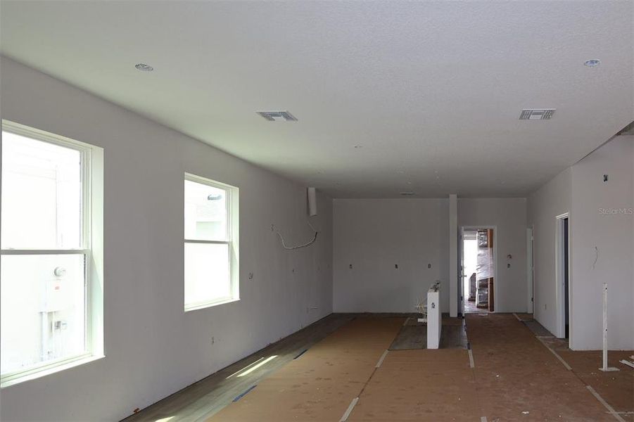 In-progress construction of a new home in Center Lake on the Park, St. Cloud, FL (Image 20).