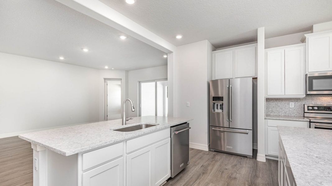 Representative furnished interior of a home built from the Redbud by D.R. Horton in Riverwalk of Cocoa, Cocoa (Image 6).