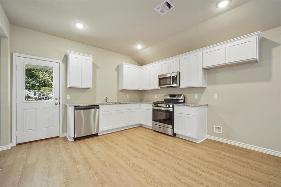 Granite counters and stainless appliances