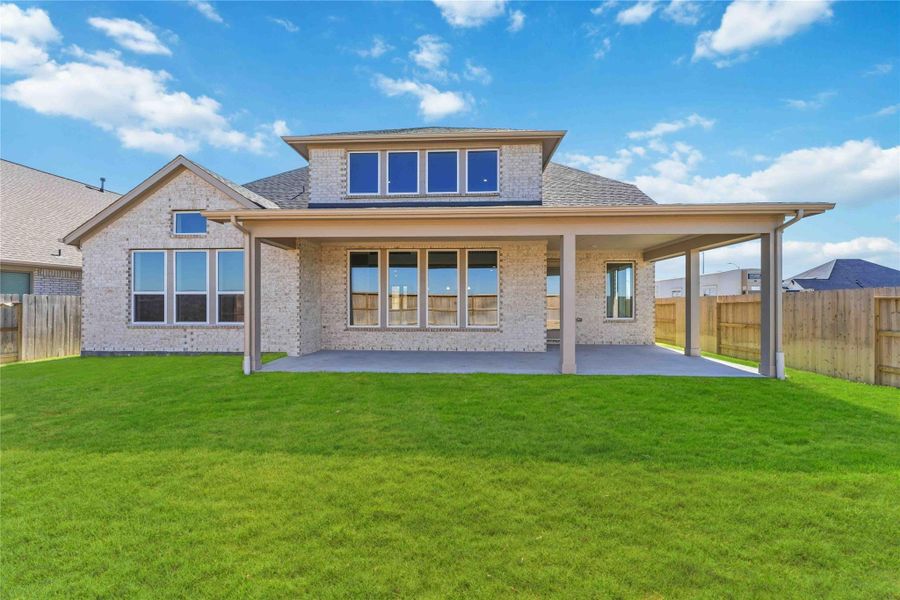 Exterior details and patio area of a home in Valencia, Manvel (Image 3). Exterior details and patio area of a home in Valencia, Manvel (Image 3).