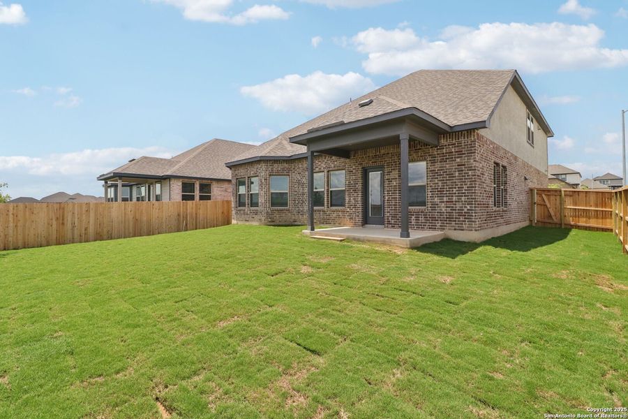 Front exterior of a new home in Arcadia Ridge - Classic Series, San Antonio, TX, highlighting curb appeal (Image 30).