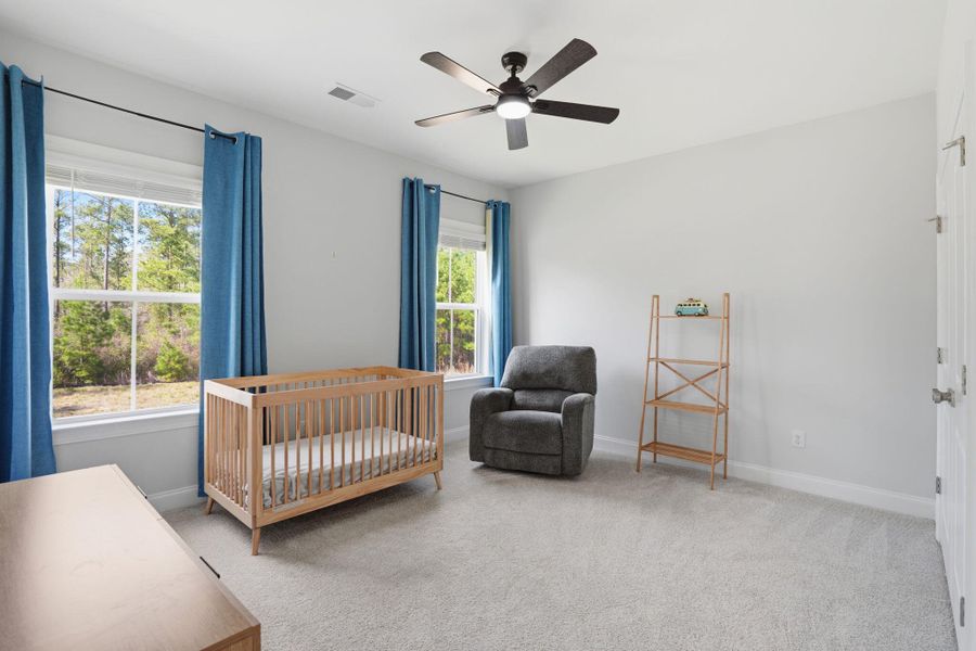 Furnished interior view inside a new home in Tidewater at Lakes of Cane Bay, Summerville (Image 29).
