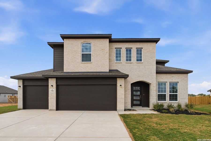 Front exterior of a new home in Hickory Ridge, Elmendorf, TX, highlighting curb appeal (Image 19).