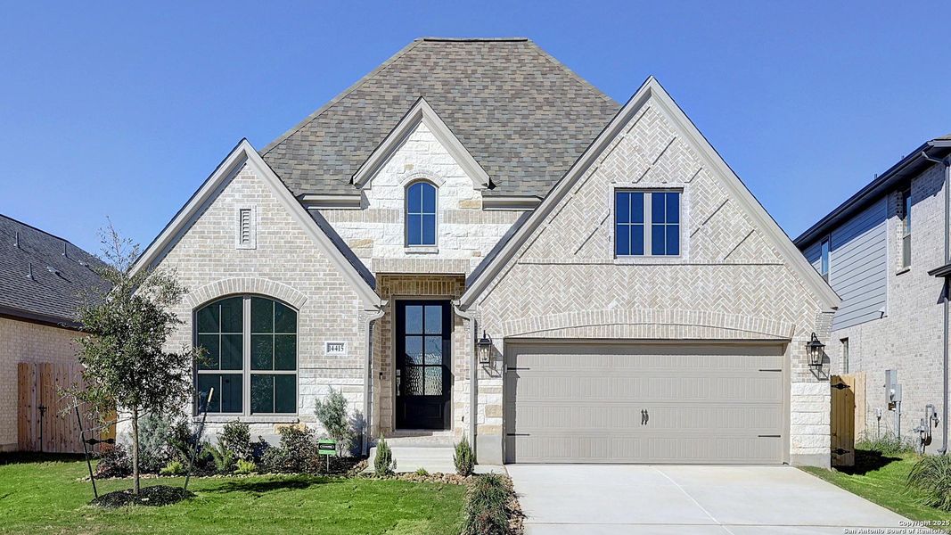 Front exterior of a new home in Kallison Ranch 50', San Antonio, TX, highlighting curb appeal (Image 25).
