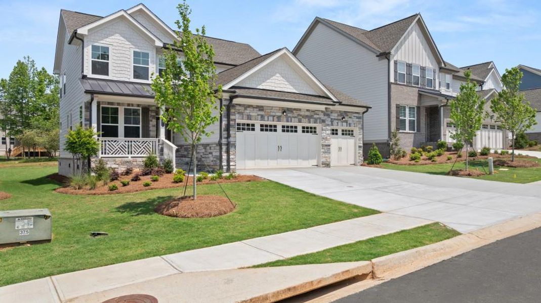Front exterior of a home in the Willow Creek community, located in Watkinsville, GA (Image 13).