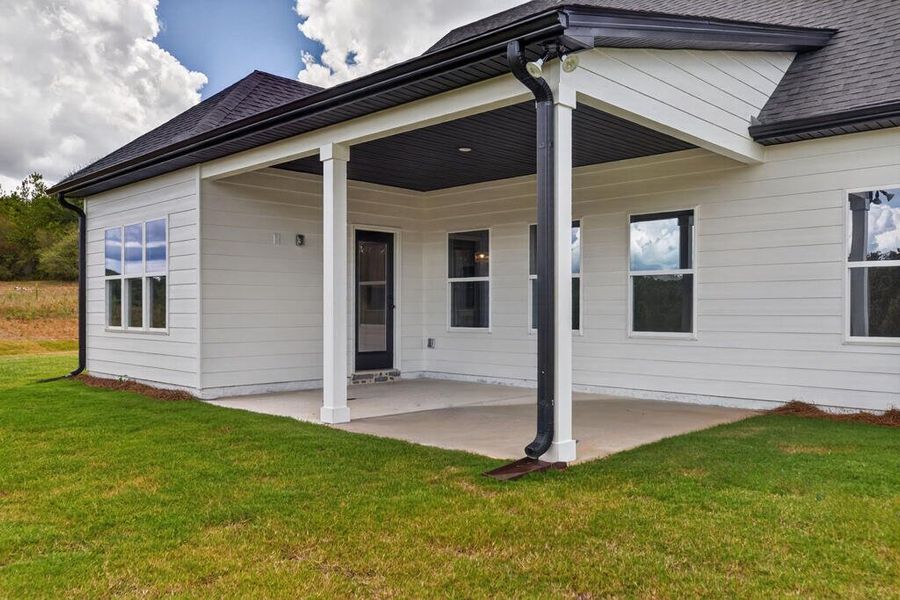 Exterior details and patio area of a home in Blackwelder Bluff, Bowdon (Image 34).