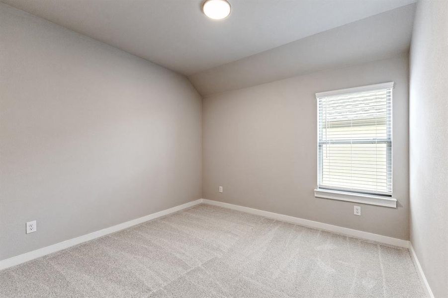 Bedroom in the Masters home plan by Trophy Signature Homes – REPRESENTATIVE PHOTO