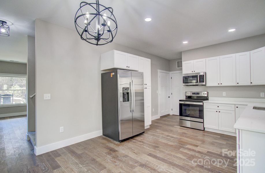 Spacious, unfurnished interior of a new home in , Asheville (Image 9).