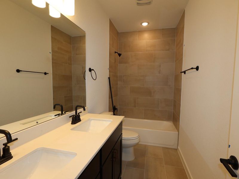 Furnished interior view inside a new home in Cedar Brook, Leander (Image 7).