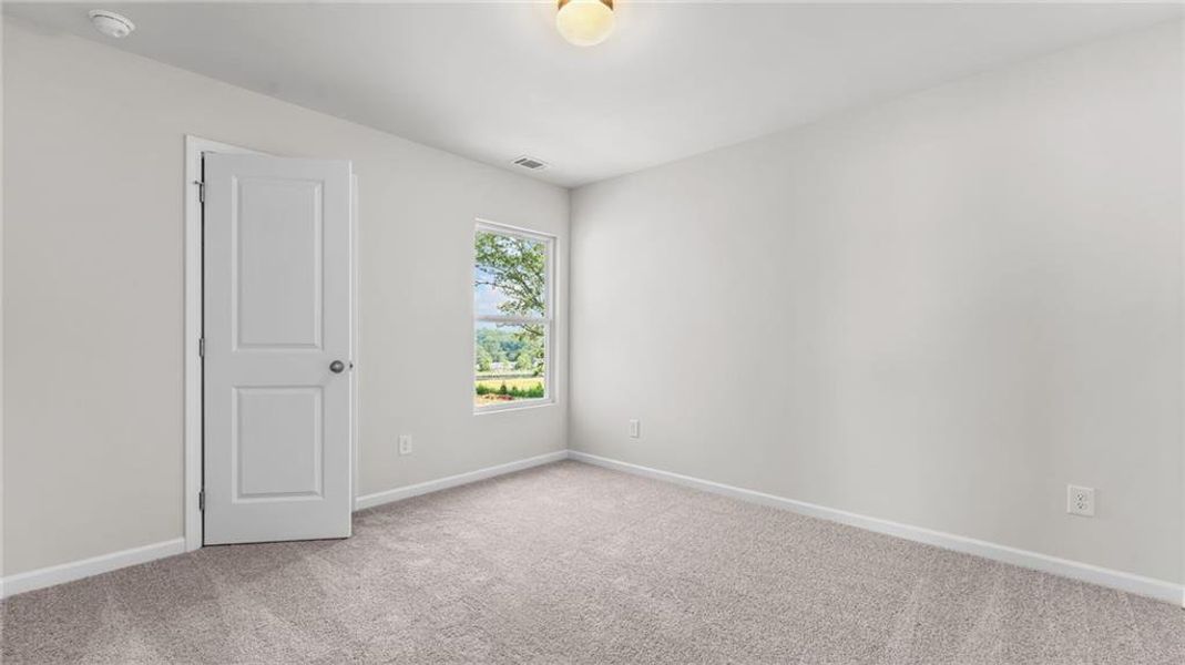 Spacious, unfurnished interior of a new home in Magnolia Trace, Flowery Branch (Image 13).