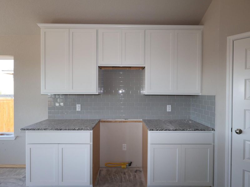 In-progress construction of a new home in Carillon, Manor, TX (Image 10).