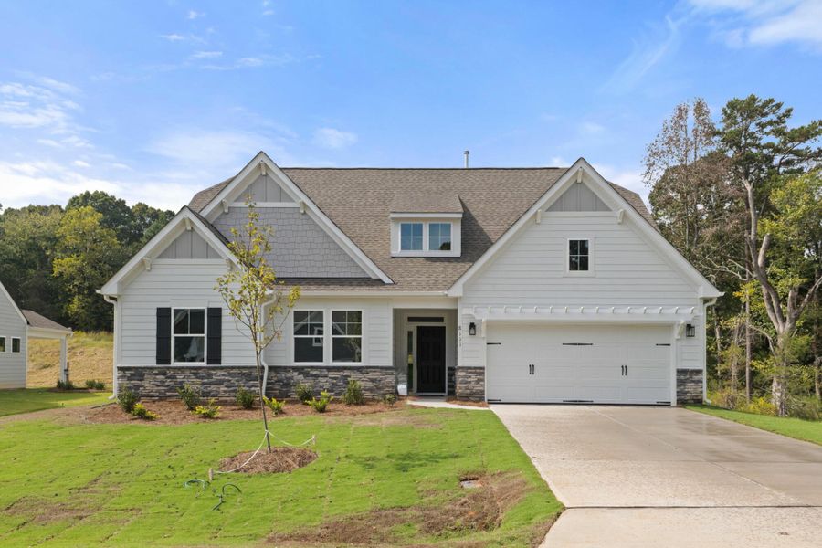 Front exterior of a new home in Grove Park, Clemmons, NC, highlighting curb appeal (Image 1).