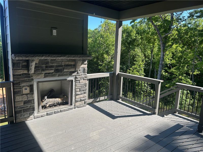 Enjoy outdoor living with a cozy fireplace on this Enjoy outdoor living with a cozy fireplace on this