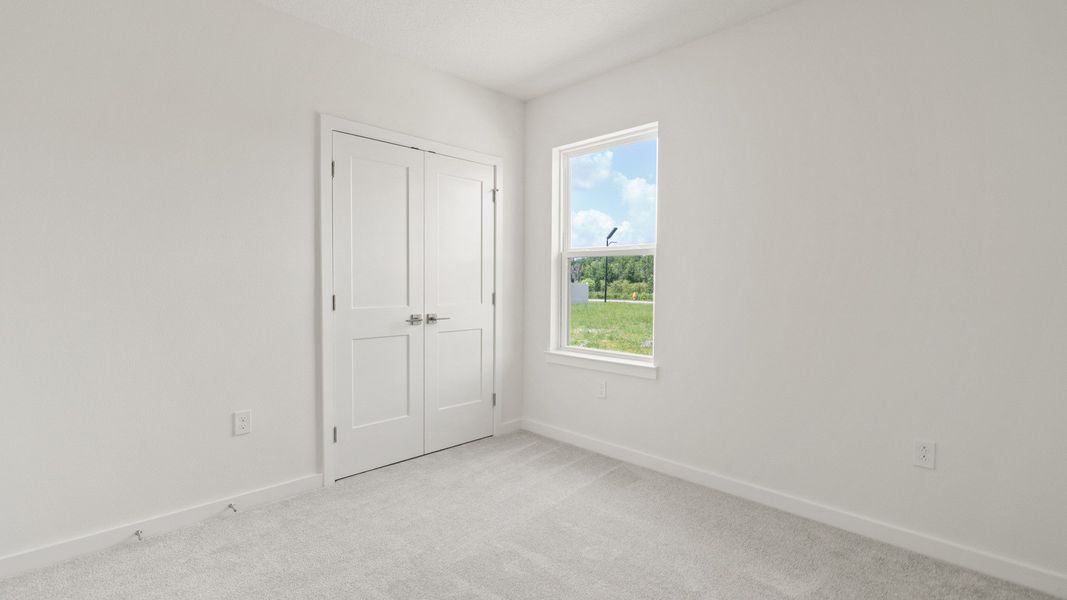 Third Bedroom in the Flagler floorplan by DRB Homes located in Hamilton Bluff. Third Bedroom in the Flagler floorplan by DRB Homes located in Hamilton Bluff.