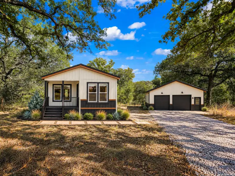 Front exterior of a new home in , Seguin, TX, highlighting curb appeal (Image 23).