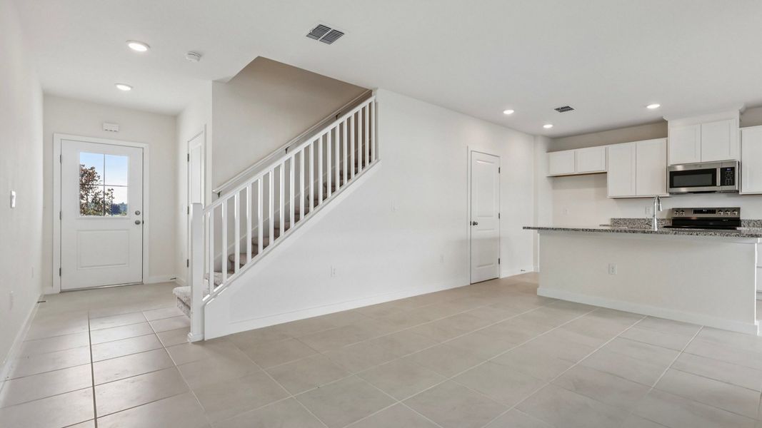 Furnished interior view inside a new home in Cyrene at Harmony, St. Cloud (Image 7).