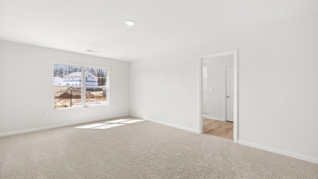 Representative unfurnished interior of a home built from the Hayden by D.R. Horton in Liberty Crossing, Braselton (Image 23).