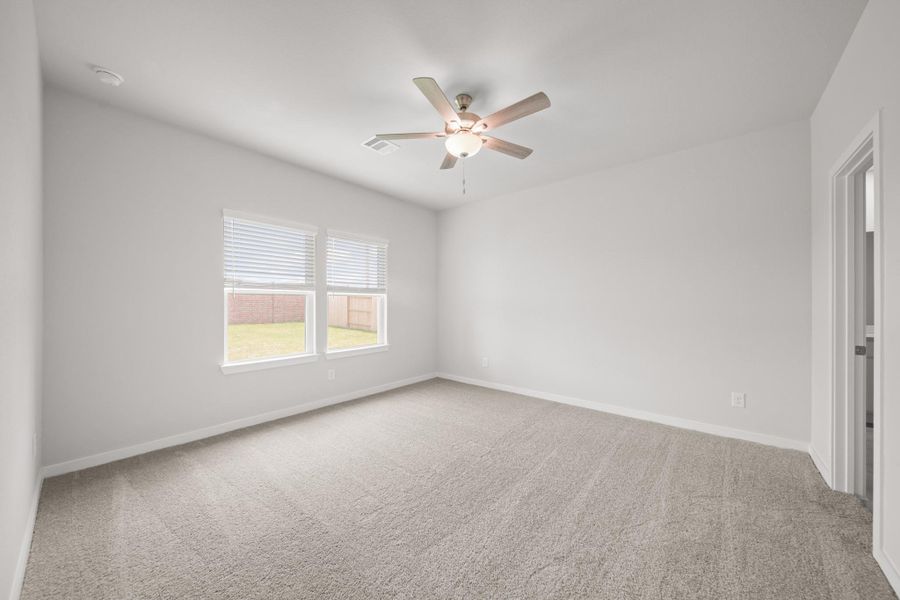 Spacious, unfurnished interior of a new home in Sunterra, Katy (Image 21).