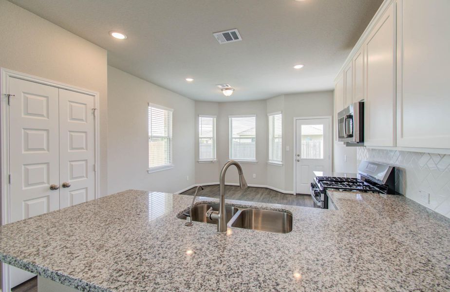 Furnished interior view inside a new home in Legends Bay, Baytown (Image 9).