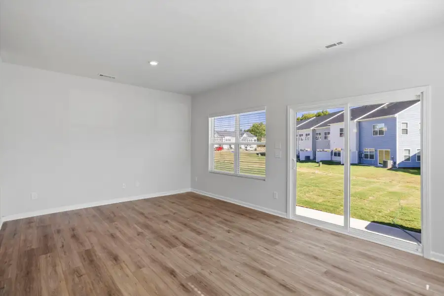 Spacious, unfurnished interior of a new home in West Main Townhomes, Sanford (Image 14).