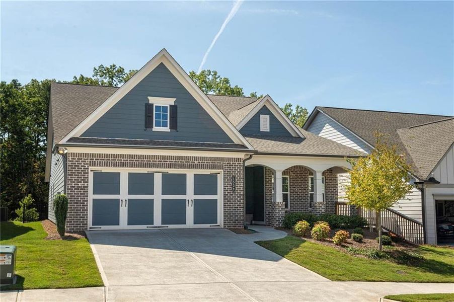 Front exterior of a new home in , Canton, GA, highlighting curb appeal (Image 23).