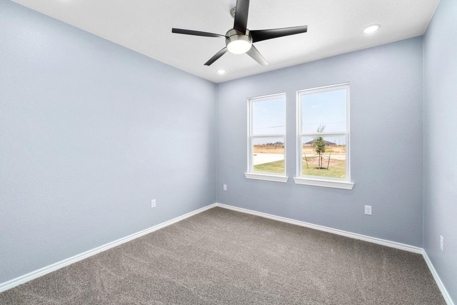 Unfurnished room featuring carpet flooring, ceiling fan, and recessed lighting Unfurnished room featuring carpet flooring, ceiling fan, and recessed lighting