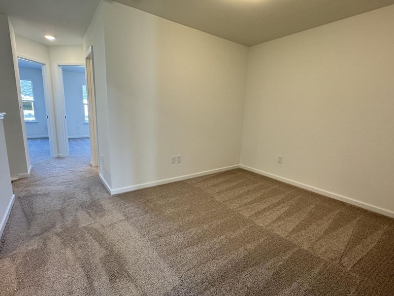 Spacious, unfurnished interior of a new home in East Main Townes, Spartanburg (Image 17).