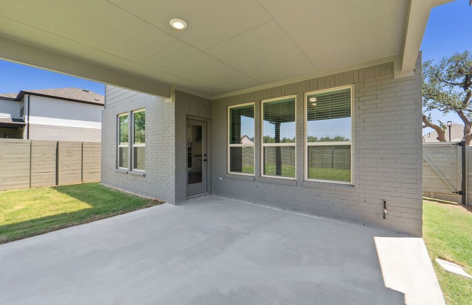 Exterior details and patio area of a home in Wolf Ranch, Georgetown (Image 32). Exterior details and patio area of a home in Wolf Ranch, Georgetown (Image 32).