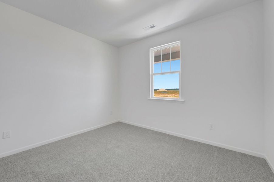 Spacious, unfurnished interior of a new home in Providence Creek, Fuquay Varina (Image 22).