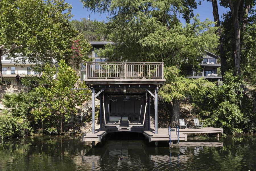 Dock area featuring a deck with water view Dock area featuring a deck with water view