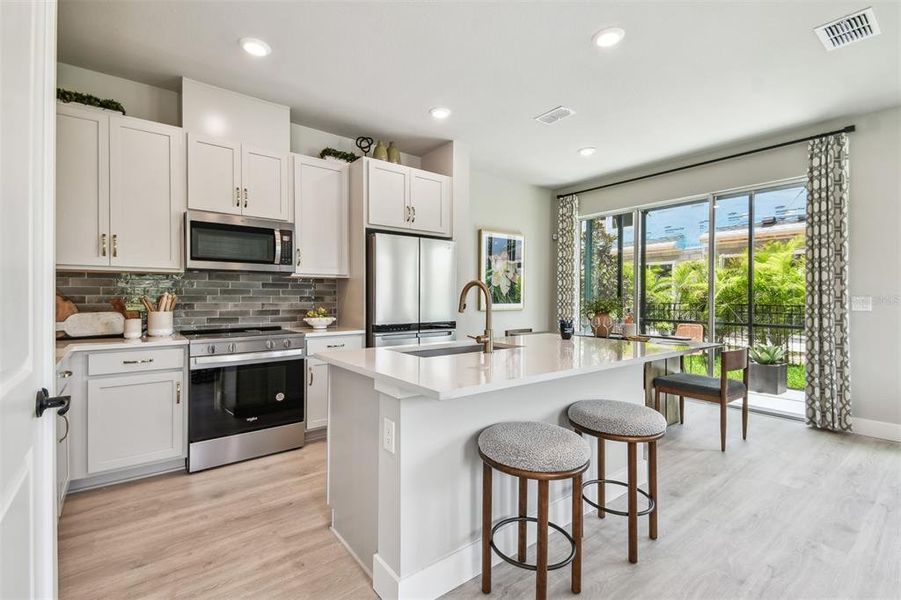 Furnished interior view inside a new home in North River Ranch – Townhomes, Parrish (Image 10).