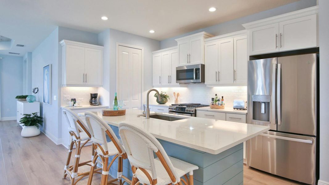 Furnished interior view inside a new home in Palm Grove Real Estate and Homes for Sale in Lakewood Ranch, FL - Neal Communities, Lakewood Ranch (Image 7).