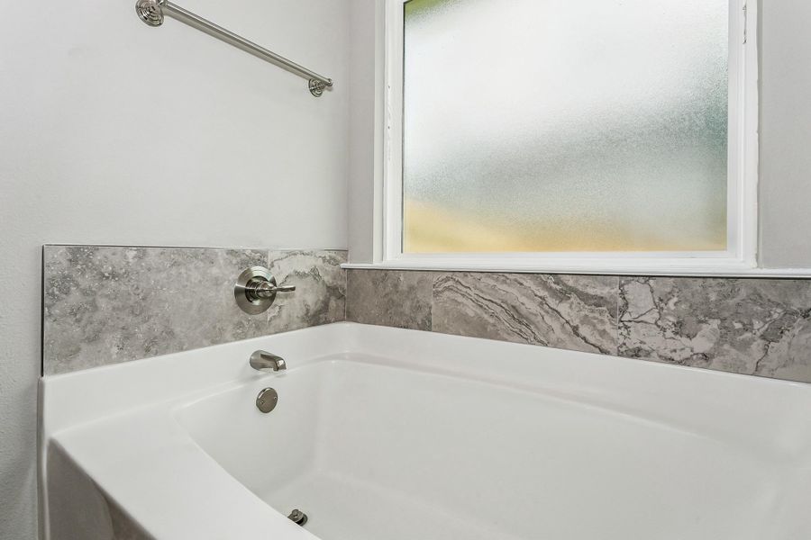 Representative interior finishes for a home built from the The Liberty by Herbst Homes in Prosperity Point, Milton (Image 58).