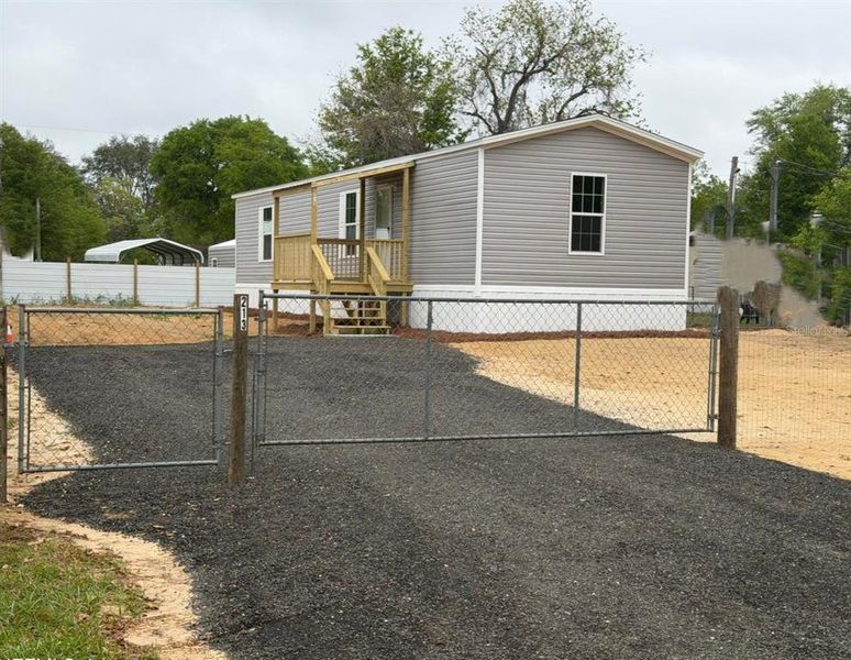 Exterior details and patio area of a home in , Interlachen (Image 18).