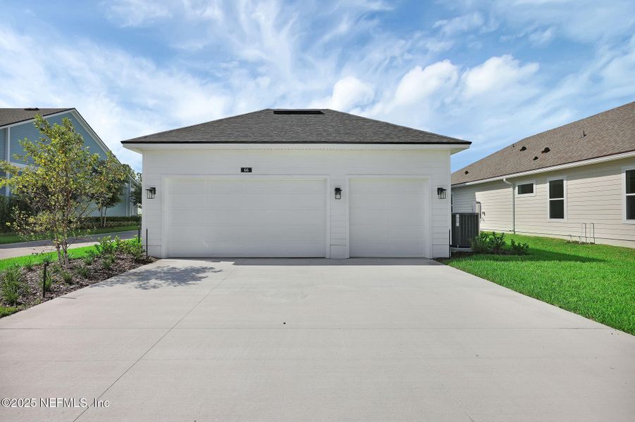 Front exterior of a new home in Seabrook Village at Seabrook, Nocatee, FL, highlighting curb appeal (Image 30). Front exterior of a new home in Seabrook Village at Seabrook, Nocatee, FL, highlighting curb appeal (Image 30).