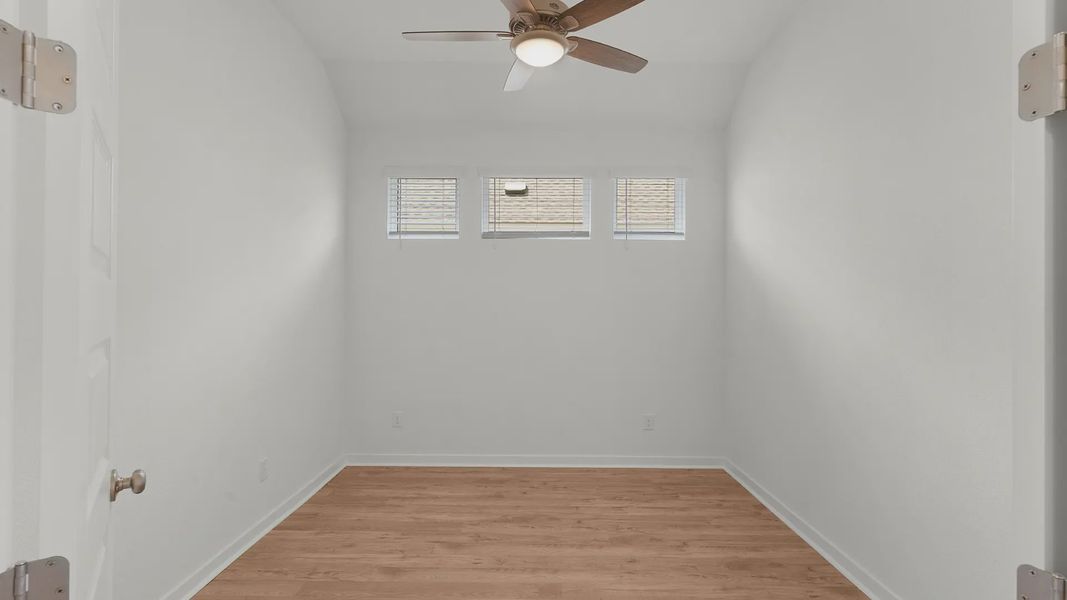 Representative unfurnished interior of a home built from the Bryson by Chesmar Homes in Newhaven, Manor (Image 12).